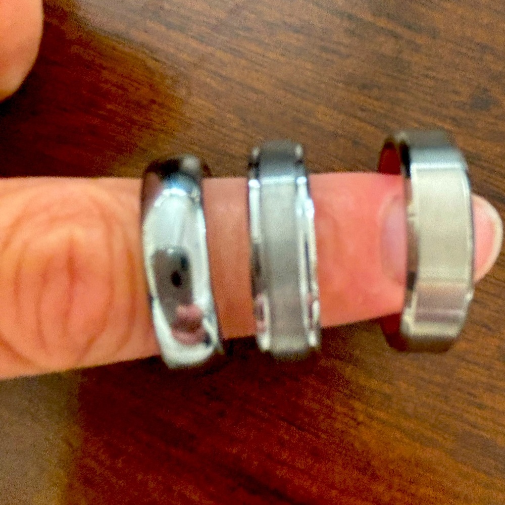 Men’s Size 11 titanium (2) and sterling silver (1) rings